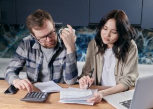 homeowner reviewing estimate with HVAC technician